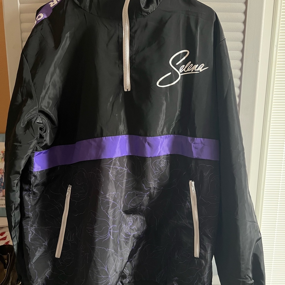 Selena official pullover windbreaker. New without tags. Size small